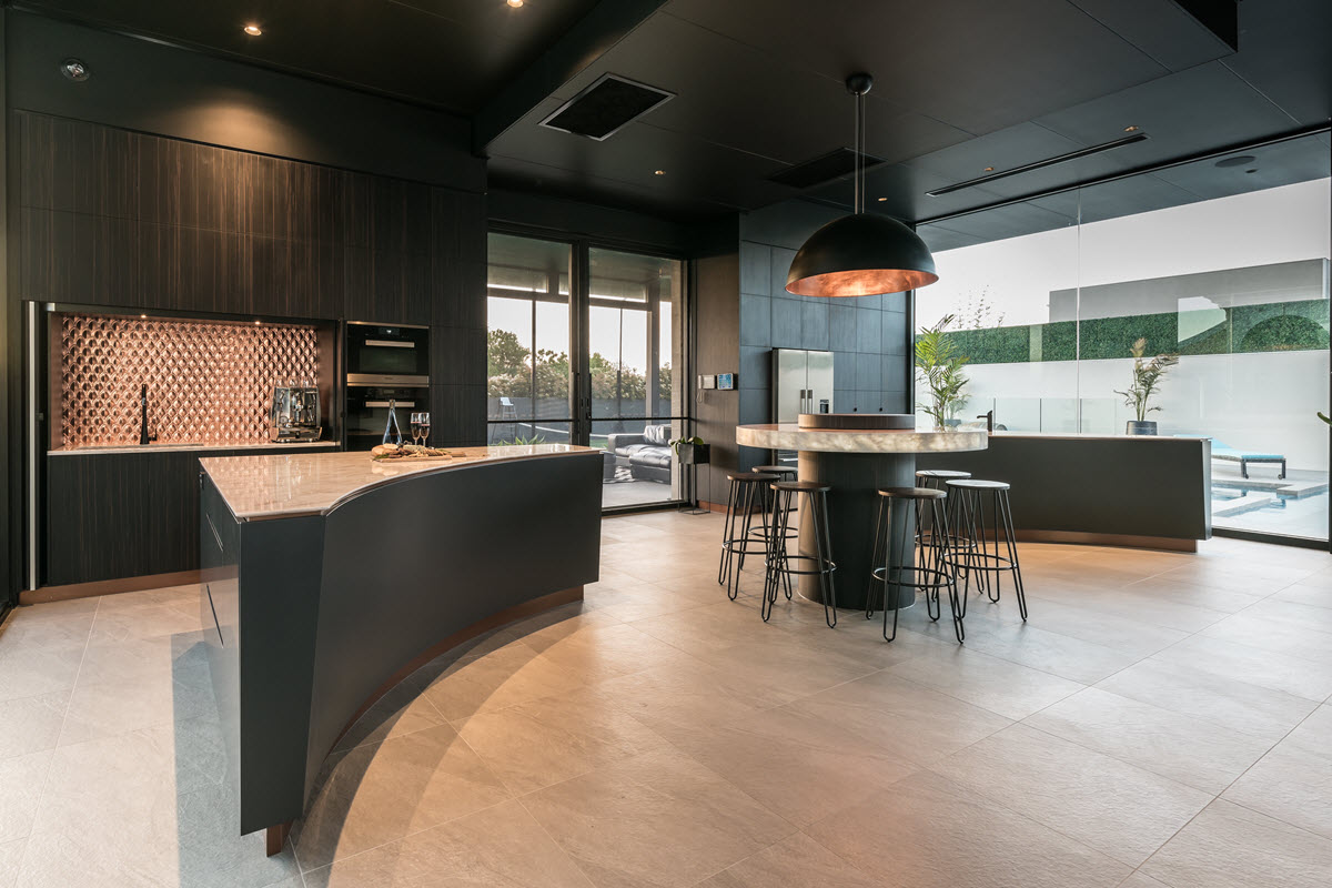 Dark timber kitchen island with dining table Adelaide